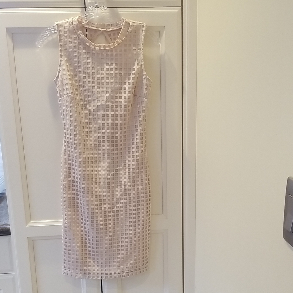 Elegant Mystic Cream Sleeveless Dress